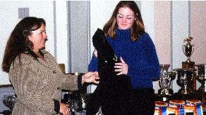 Kim Receiving Her Champion Coat
